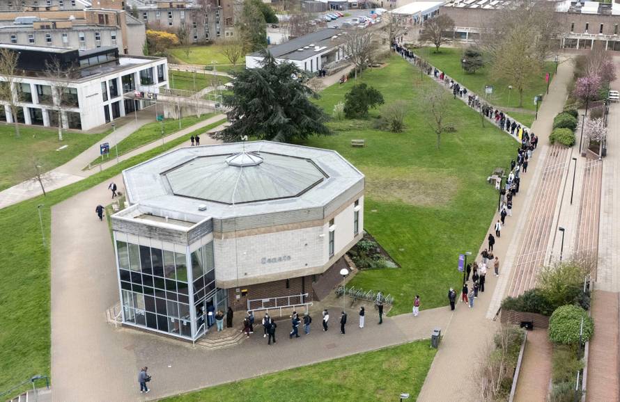 Students queuing for antibiotics outside a building at the University of Kent in Canterbury. The university have confirmed that a student was one of two people who have died as a result of meningitis in the area. The UK Health Security Agency (UKHSA) said