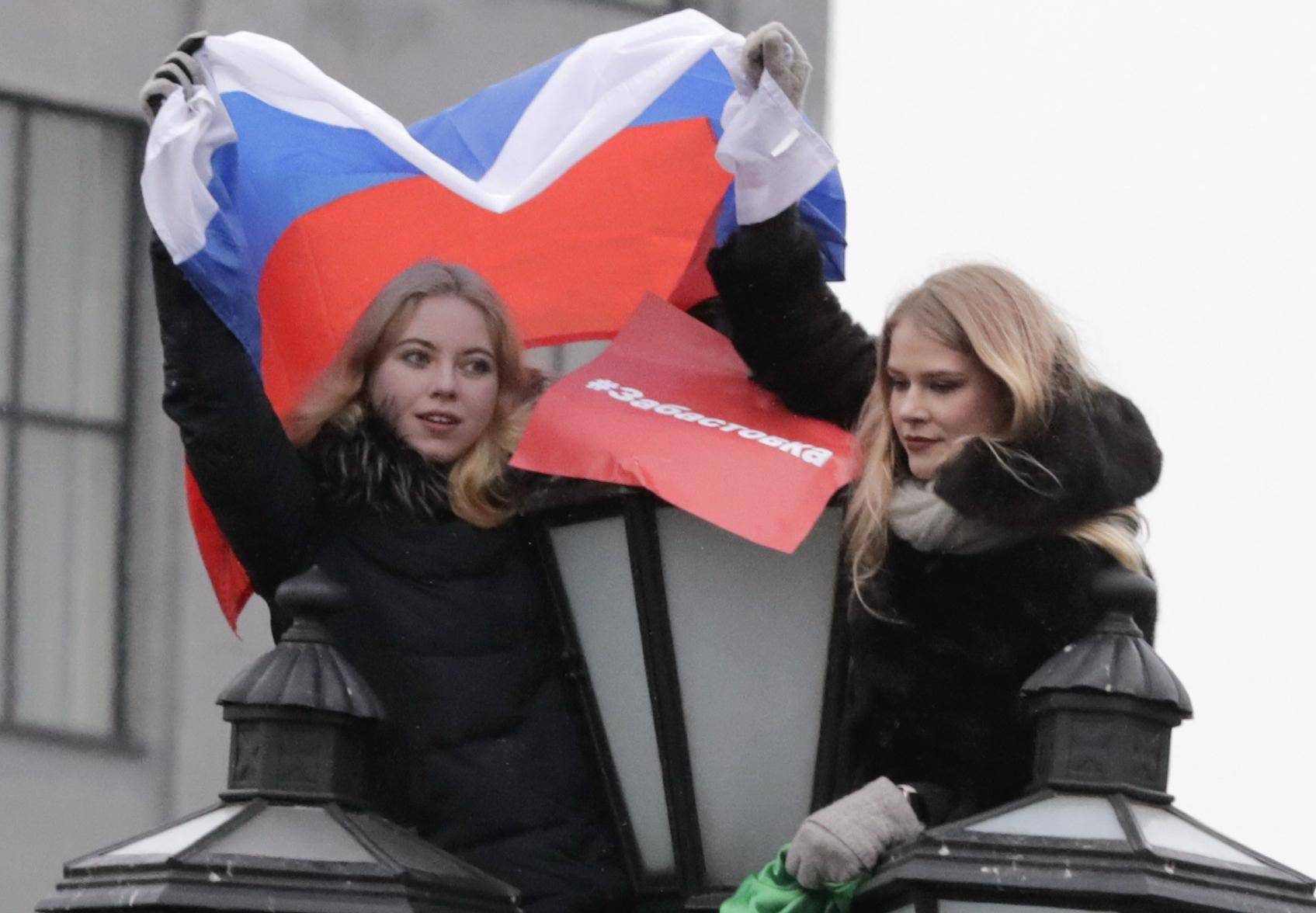 Supporters of Russian opposition leader Navalny attend a rally in Moscow