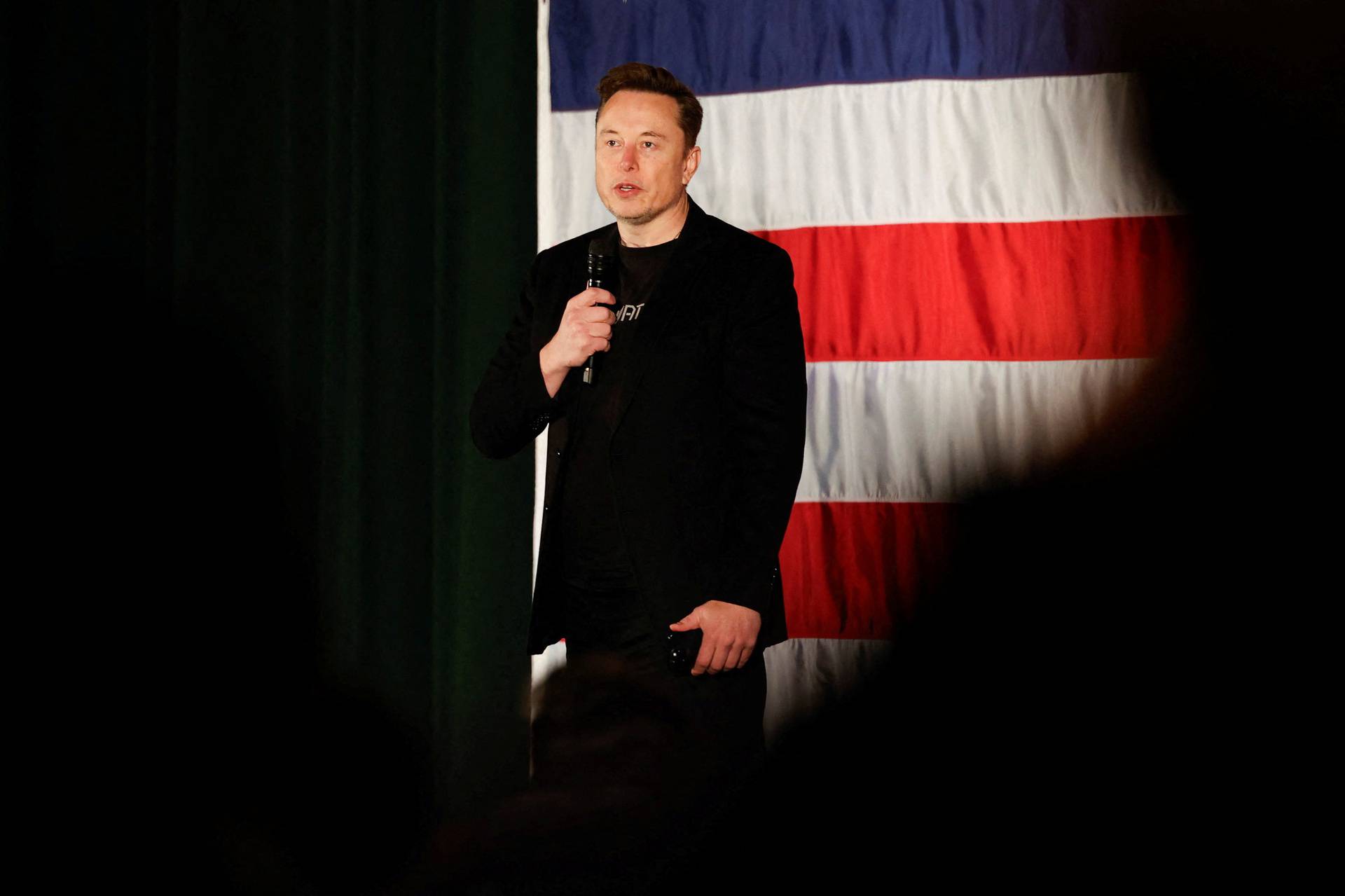 Tesla CEO and X owner Elon Musk speaks about voting during an America PAC Town Hall, in Folsom