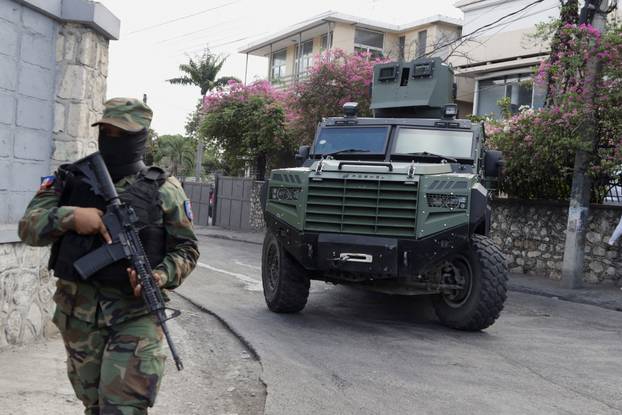 Security forces guard key offices as Haiti faces uncertain transition, in Port-au-Prince