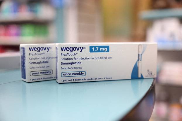 FILE PHOTO: Boxes of Novo Nordisk wight-loss drug Wegovy are seen at a pharmacy in London