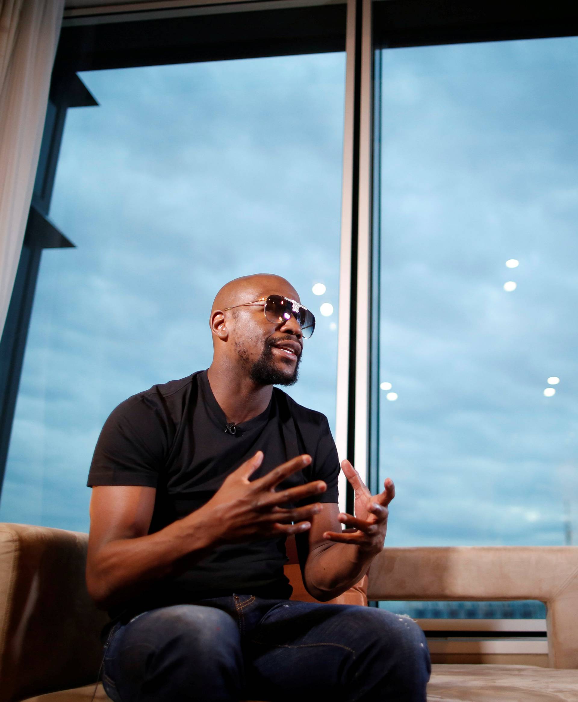 Undefeated boxer Mayweather Jr. of the U.S. speaks during an interview with Reuters in Tokyo