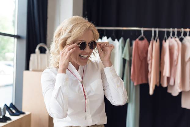 woman shopping in clothing boutique