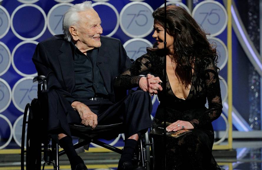 Presenters Kirk Douglas and Catherine Zeta Jones at the 75th Golden Globe Awards in Beverly Hills, California