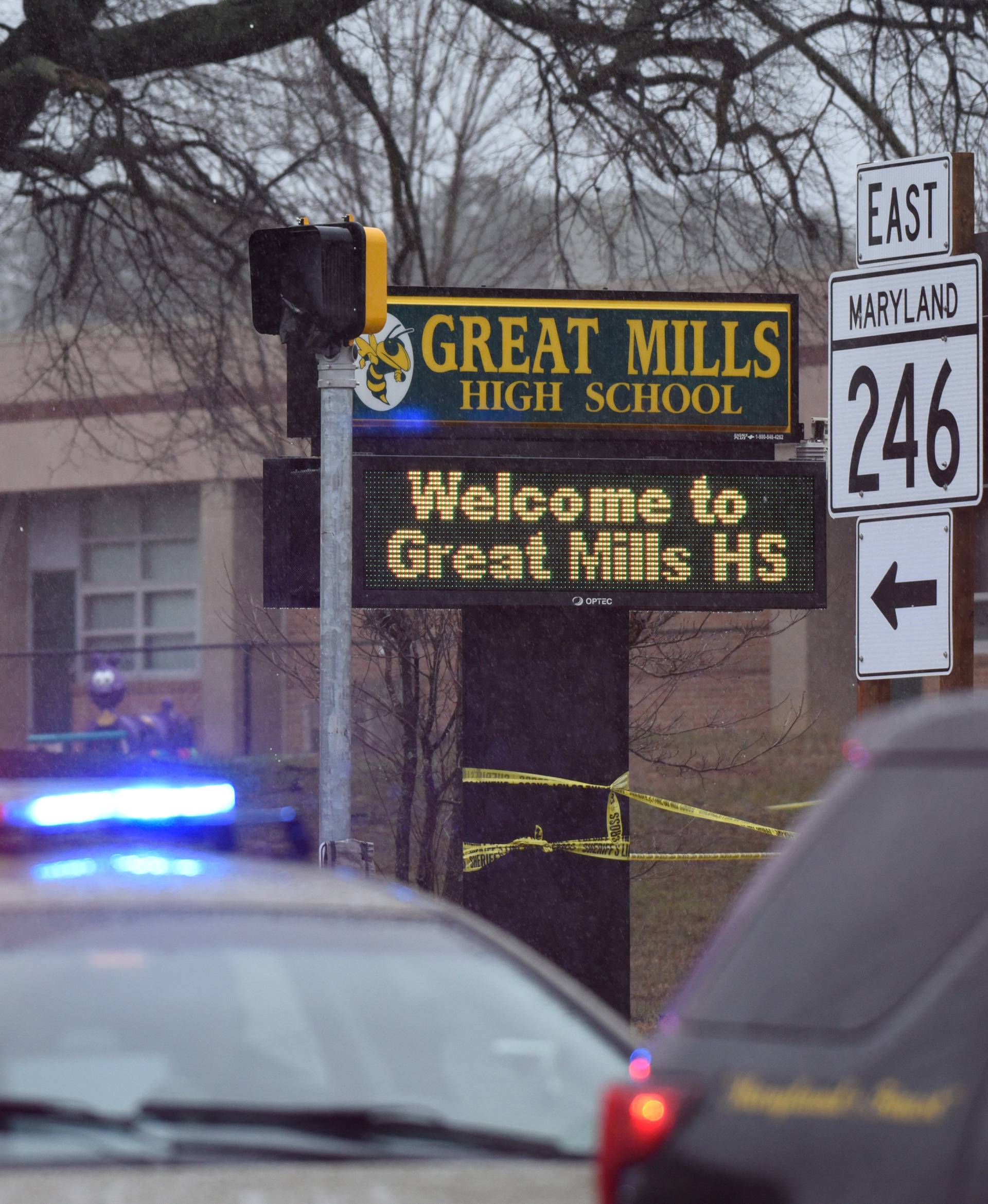 Law enforcement vehicles are seen outside the Great Mills High School following a shooting on Tuesday morning in St. Mary's County, Maryland