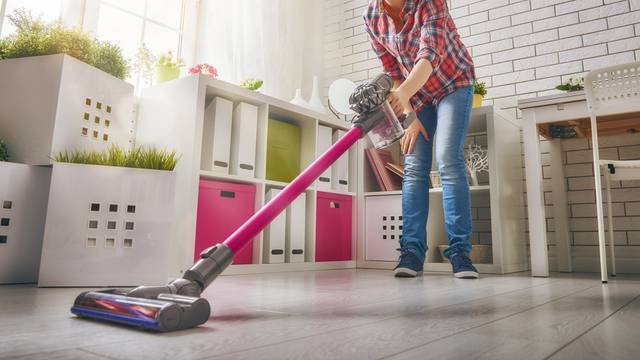 Beautiful,Young,Woman,Makes,Cleaning,The,House.,Woman,Vacuums,The