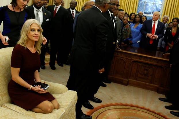 Senior advisor Kellyanne Conway sits on a couch as U.S. President Donald Trump welcomes the leaders of dozens of historically black colleges and universities (HBCU) in the Oval Office at the White House in Washington