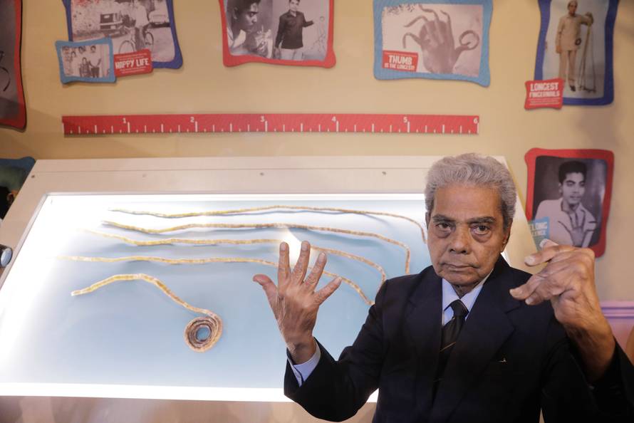 Shridhar Chillal of India displays his newly cut fingernails at an announcement that the five fingernails he grew for 66 years will be displayed in Ripley's Believe it or Not in New York