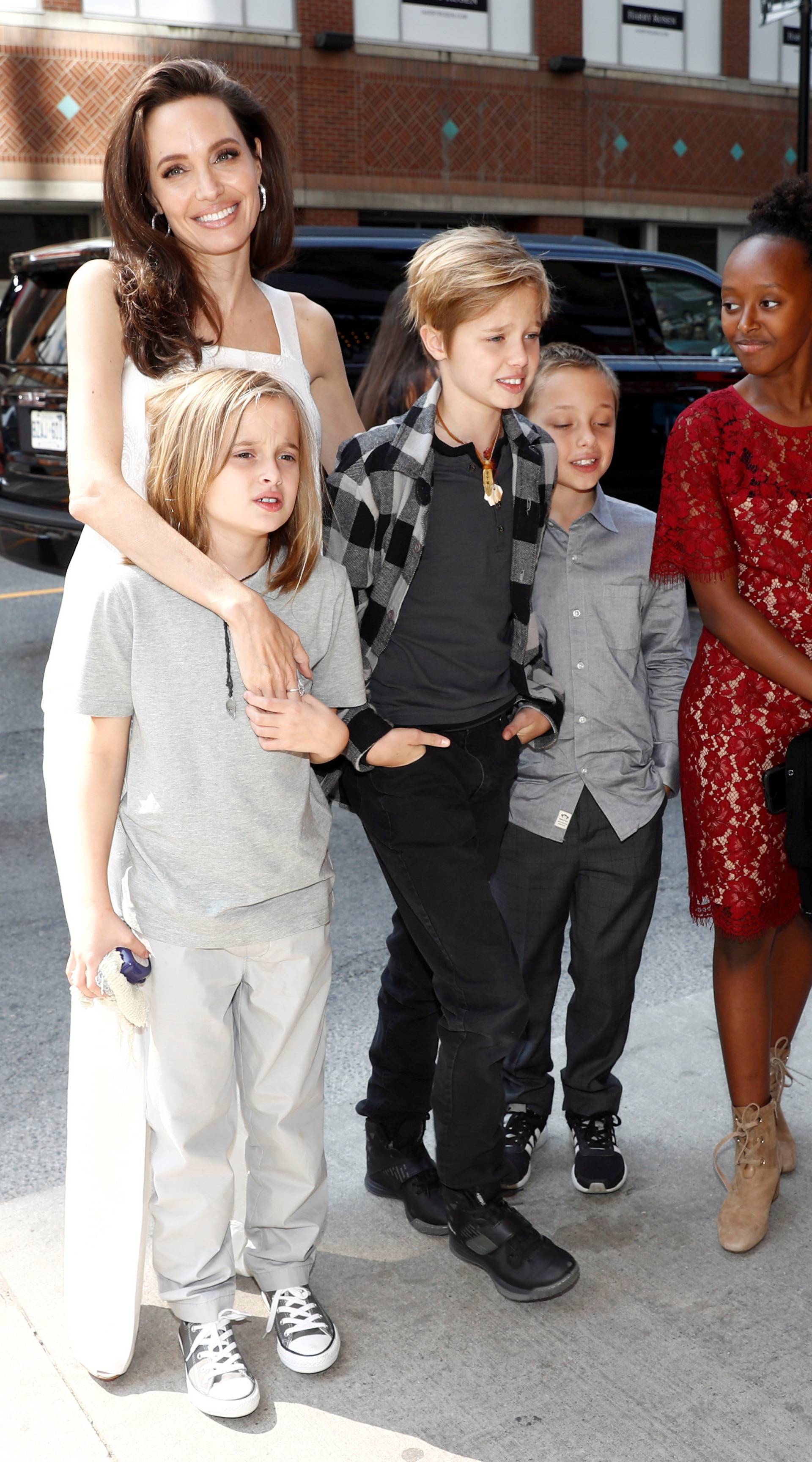 Jolie arrives on the red carpet with her children for the film "The Breadwinner" during the Toronto International Film Festival in Toronto