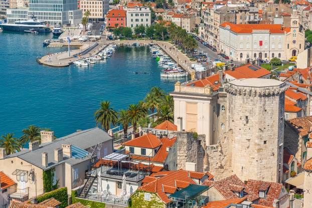 aerial view of Riva promenade in Split with Marjan hill, Croatia