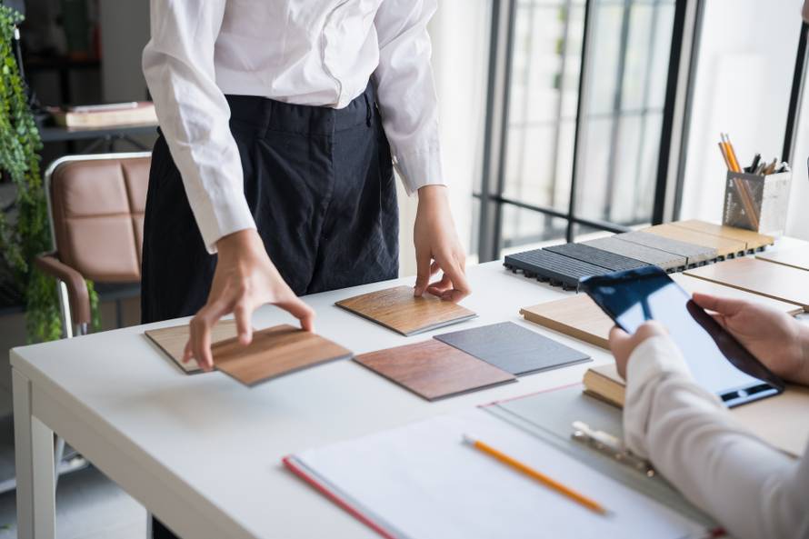 Client,And,Interior,Designer,Selecting,Materials,For,Home,Decoration,In