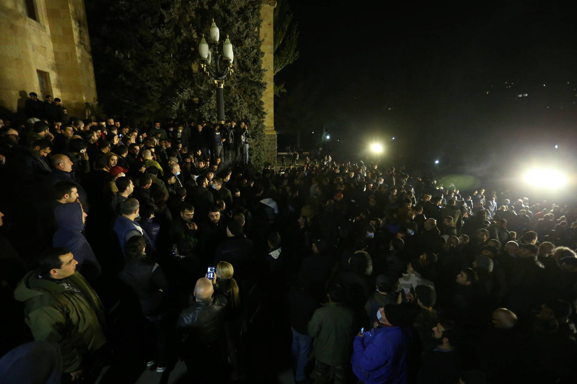 People gather outside the parliament in Yerevan