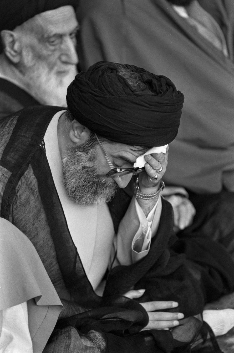FILE PHOTO: Iran's Supreme Leader Ali Khamenei wipes his brow during a memorial service for the late Ayatollah Ruhollah Khomeini in Tehran, Iran