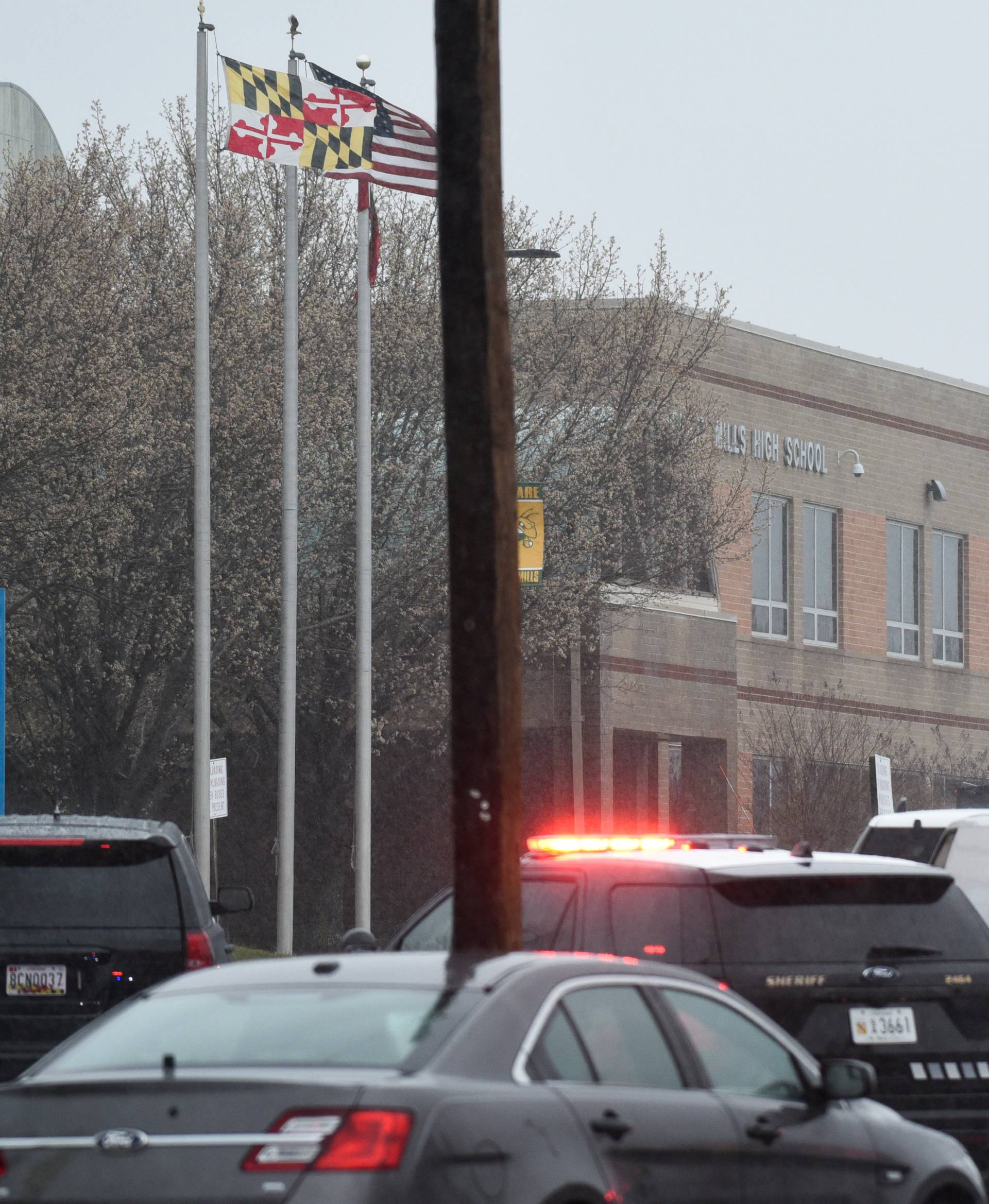 Emergency services and law enforcement vehicles are seen outside the Great Mills High School following a shooting on Tuesday morning in St. Mary's County, Maryland