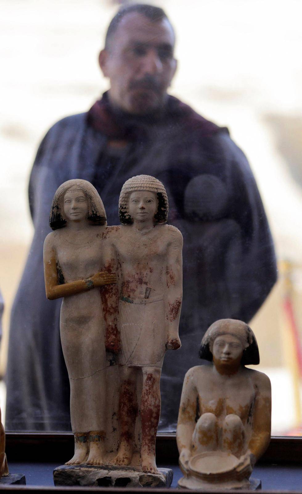 Statues are displayed after the announcement of the discovery of 4,300-year-old sealed tombs in Egypt's Saqqara necropolis, in Giza