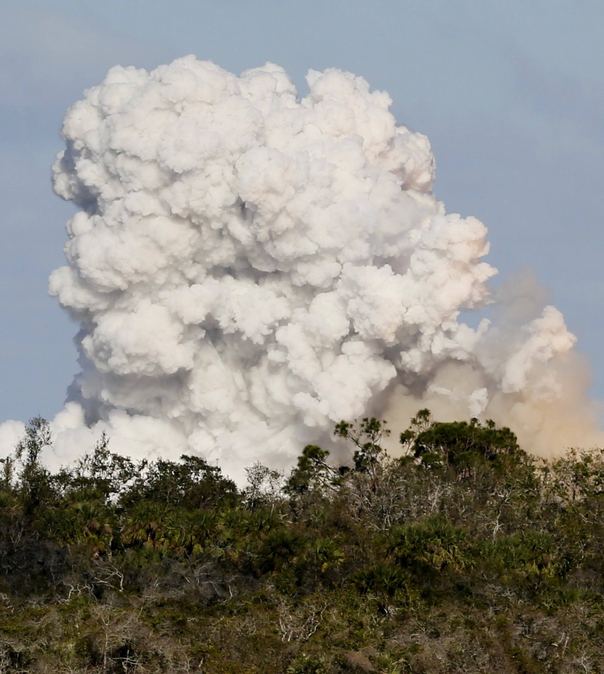 A SpaceX Falcon Heavy rocket lifts off from the Kennedy Space Center in Cape Canaveral