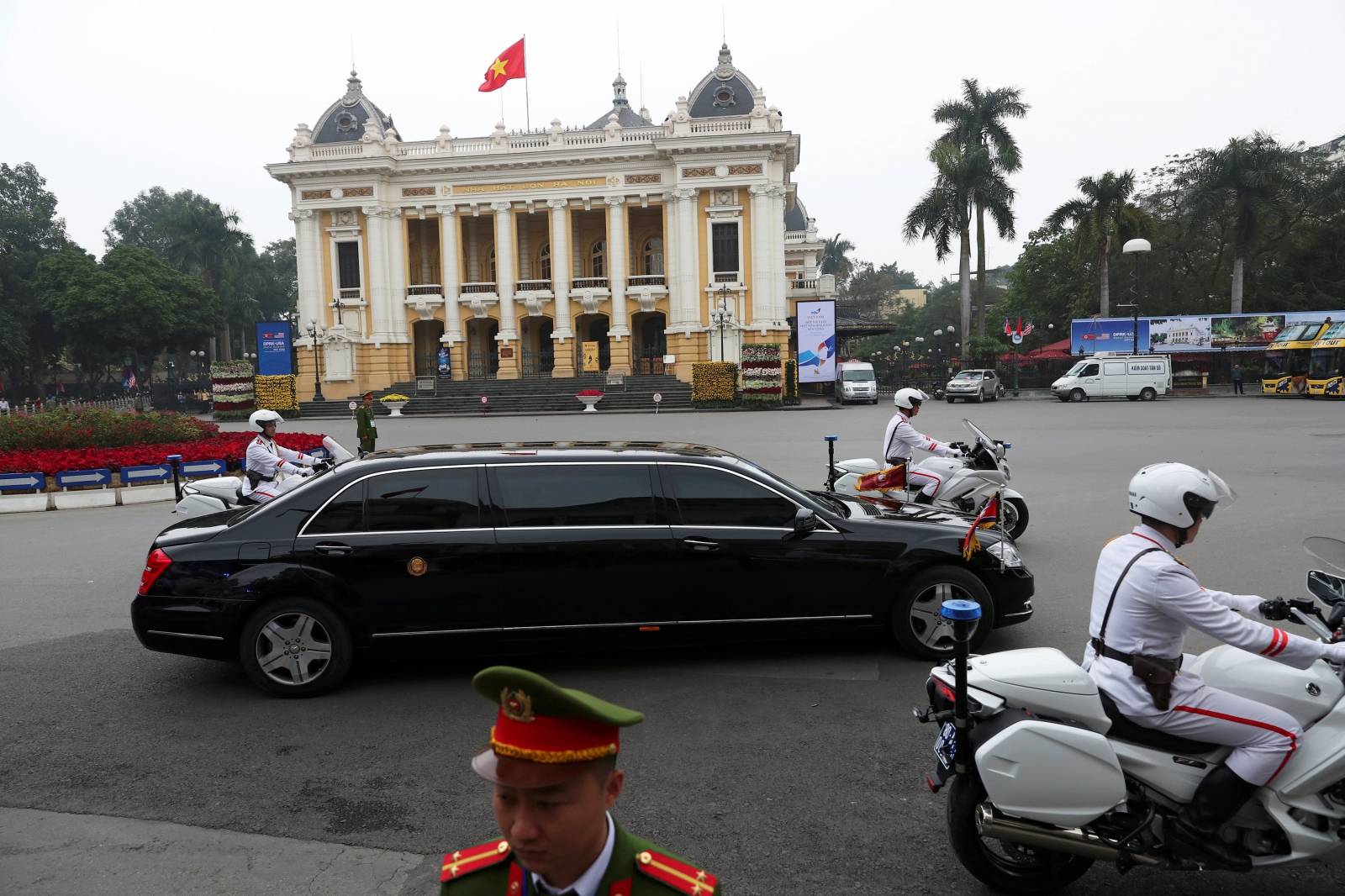 The motorcade transporting North Korean leader Kim Jong Un passes the Opera House after leaving the Metropole Hotel after his meeting with U.S. President Donald Trump for the second North Korea-U.S. summit in Hanoi