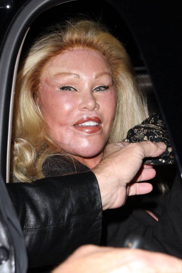 Jocelyn Wildenstein and her beau head for home after a night out at the BOA Steakhouse