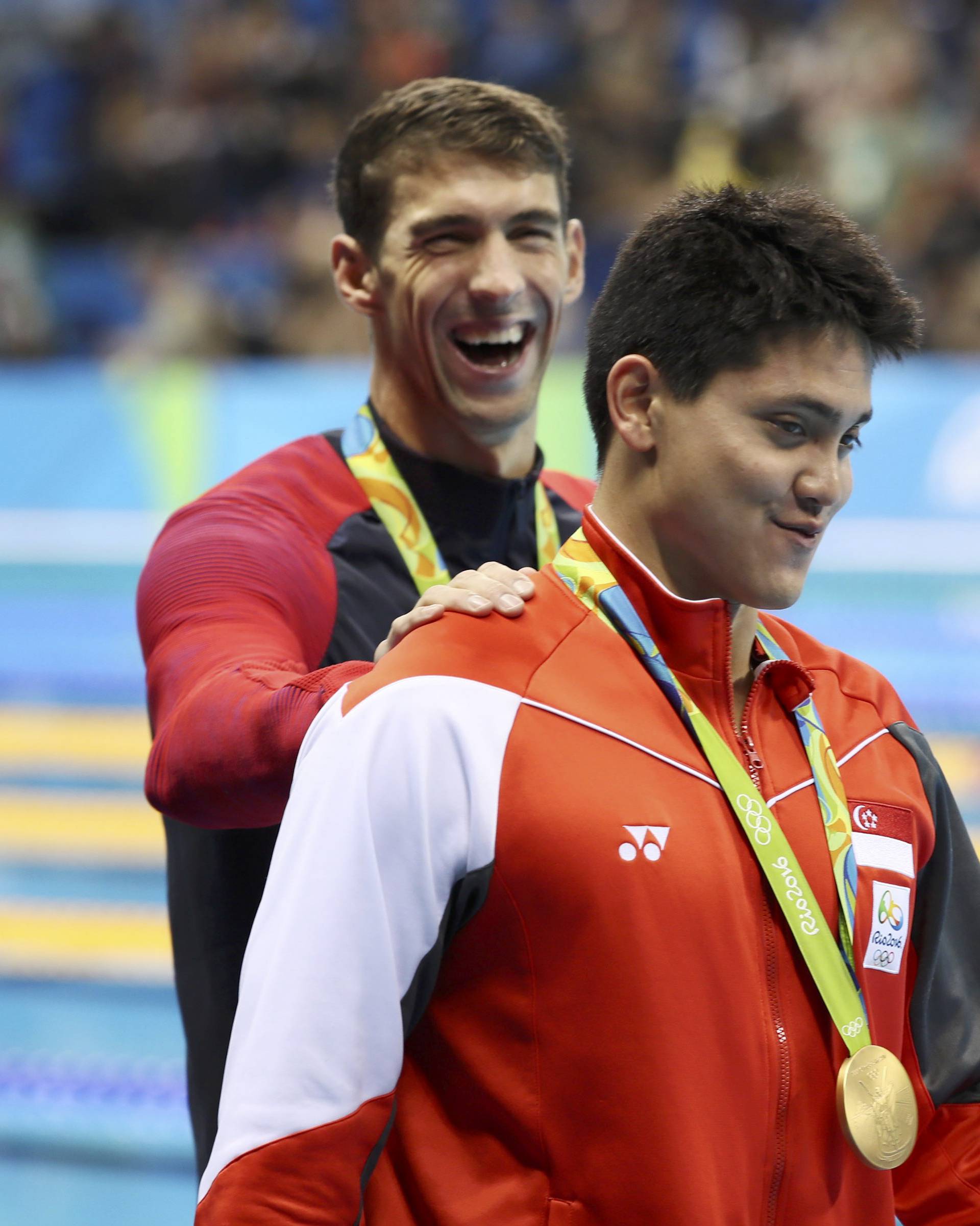 Swimming - Men's 100m Butterfly Victory Ceremony