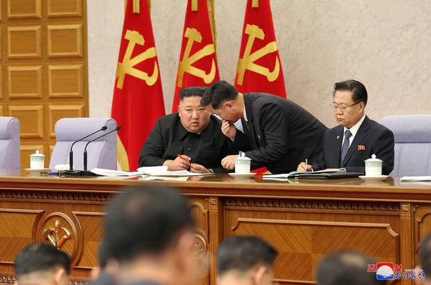 KCNA image of North Korean leader Kim Jong Un at a plenary meeting of the Workers