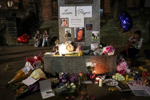 Fans gather and place tributes to former One Direction singer Liam Payne, in Wolverhampton