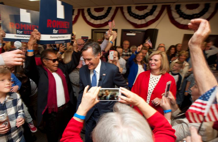 Republican U.S. senate candidate Mitt Romney reacts after appearing at his election night party in Orem
