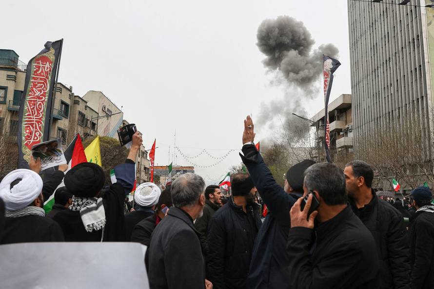 Smoke rises following an explosion during a protest marking the annual al-Quds Day (Jerusalem Day) on the last Friday of the holy month of Ramadan, amid the U.S.-Israeli conflict with Iran, in Tehran