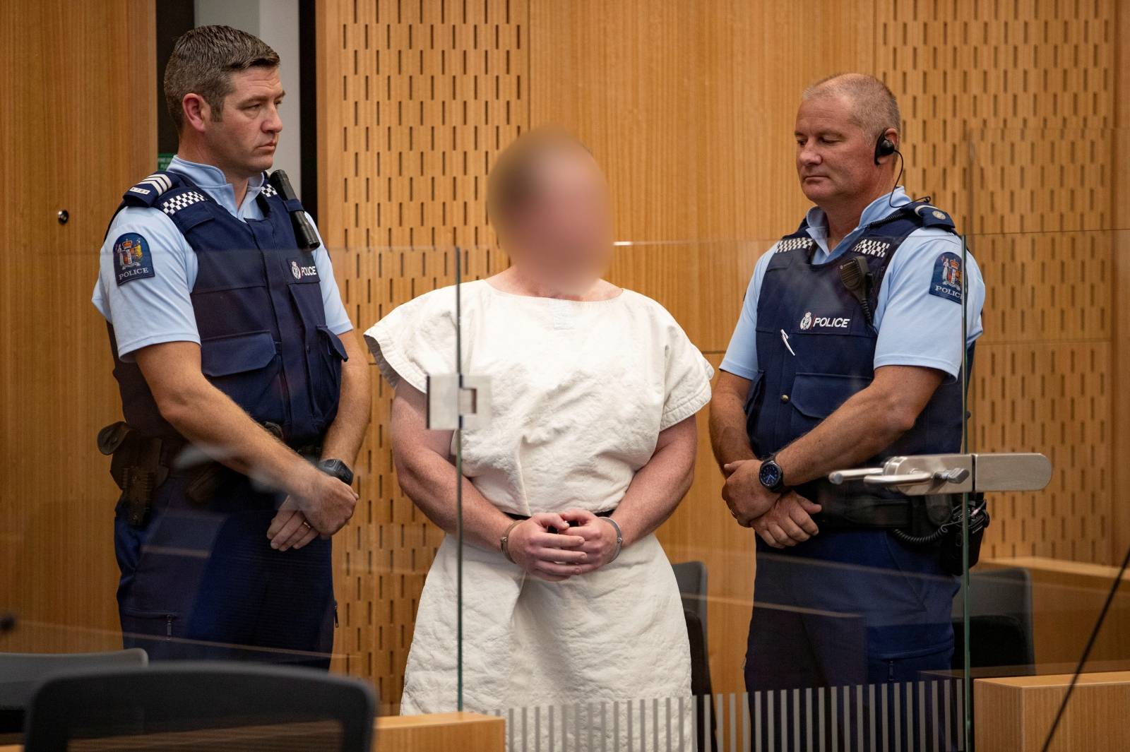 FILE PHOTO: Brenton Tarrant, charged for murder in relation to the mosque attacks, is seen in the dock during his appearance in the Christchurch District Court