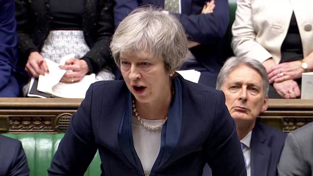 British Prime Minister Theresa May addresses Parliament ahead of the vote on May's Brexit deal, in London