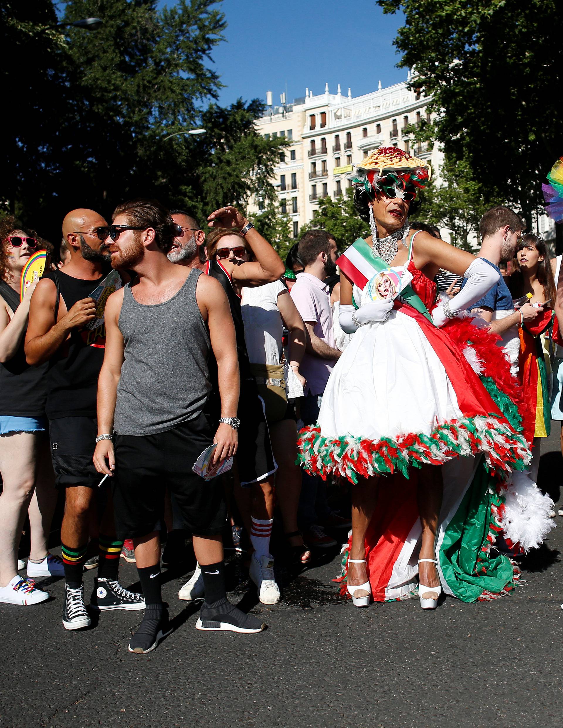 Revellers attend the World Pride parade in Madrid