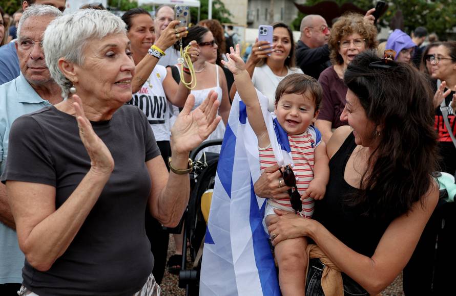 Reactions after Trump announced that Israel and Hamas agreed on the first phase of a Gaza ceasefire, in Tel Aviv