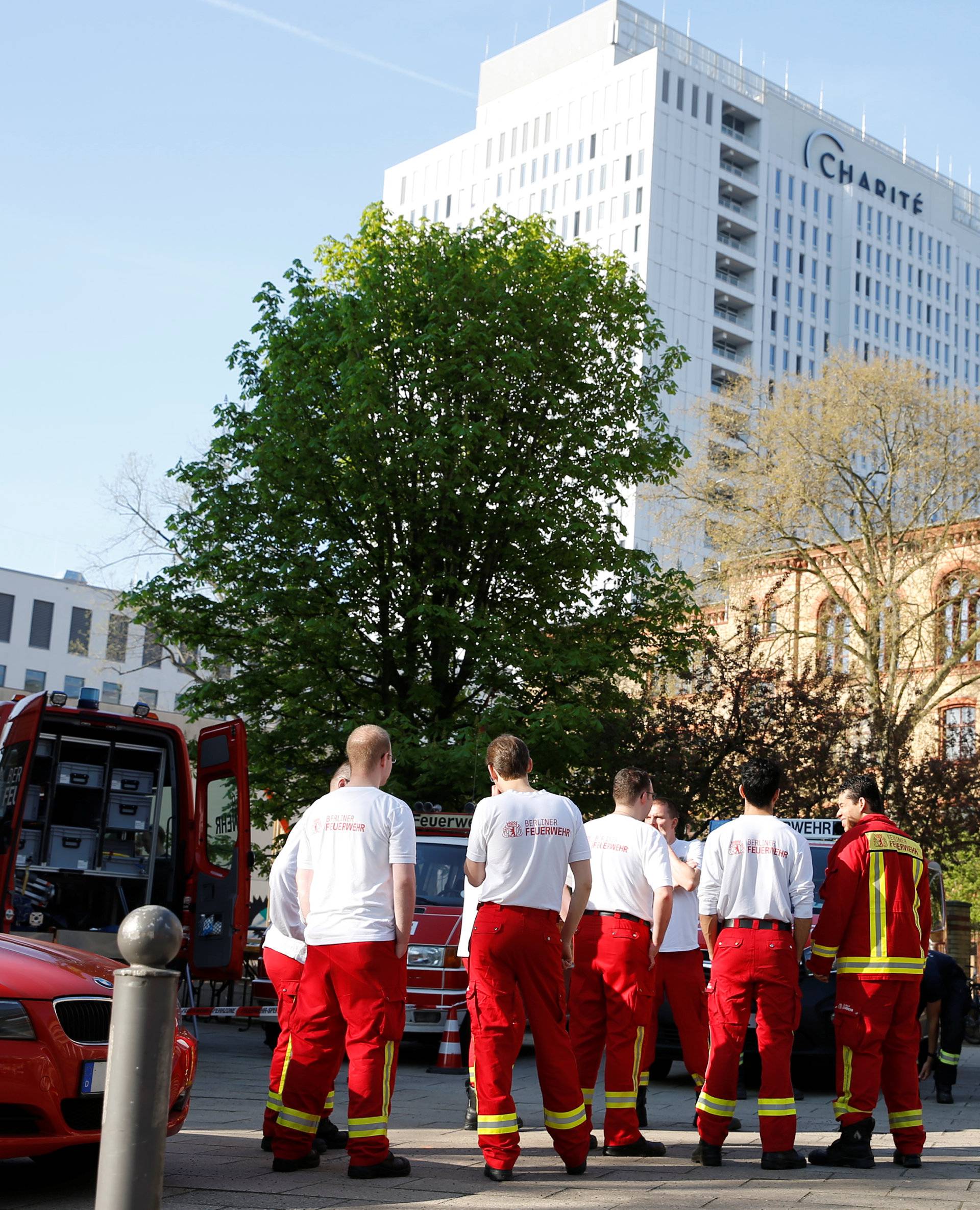 Berlin's Charite hospital evacuate while a World War Two bomb is defused near the central train station in Berlin