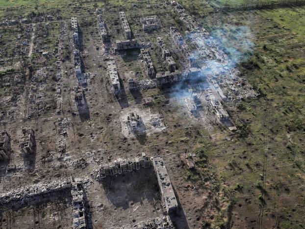 A drone view shows destroyed buildings in the frontline town of Chasiv Yar