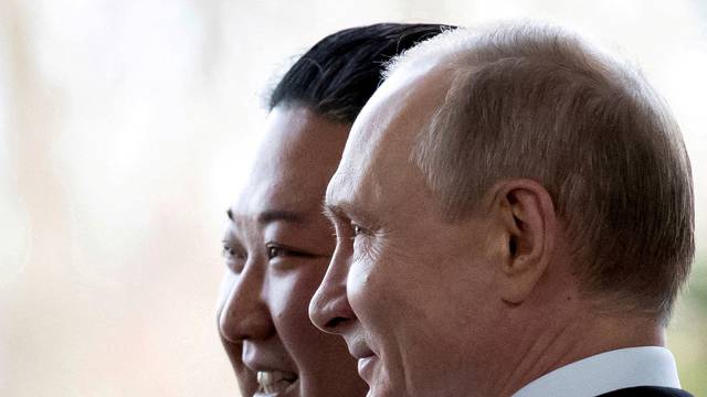 FILE PHOTO: FILE PHOTO: Russian President Vladimir Putin and North Korea's leader Kim Jong Un meet in Vladivostok in 2019