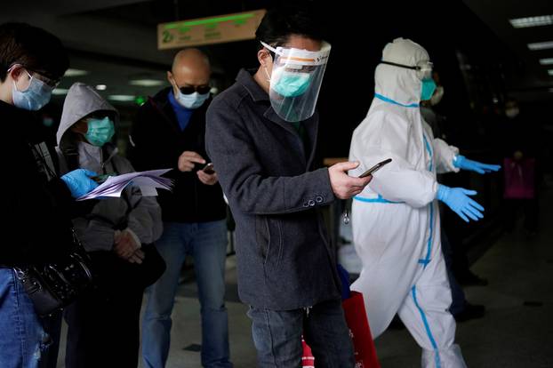 Trader He Ximing, 52, a recovered COVID-19 patient who tested positive for the virus