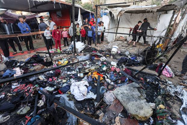 Aftermath of an Israeli strike on tents of displaced people, in Deir Al-Balah