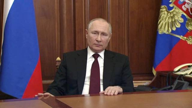 FILE PHOTO: Russian President Vladimir Putin delivers a video address to the nation in Moscow