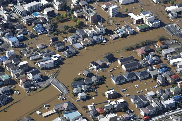An aerial view shows a residential area flooded due to heavy rain caused by Typhoon Dujuan in Sakura, Japan