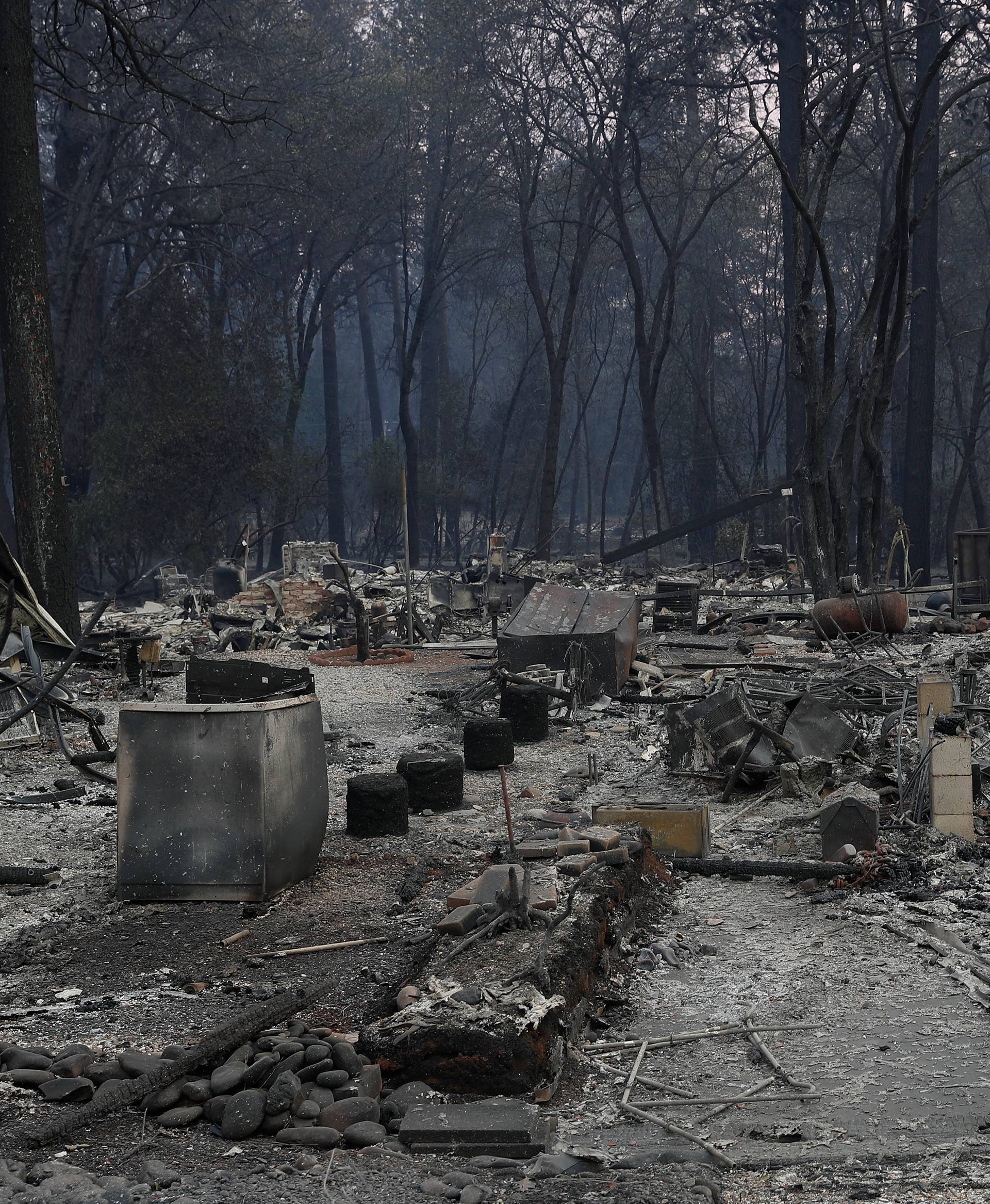 A view of homes destroyed by the Camp Fire are seen in Paradise, California