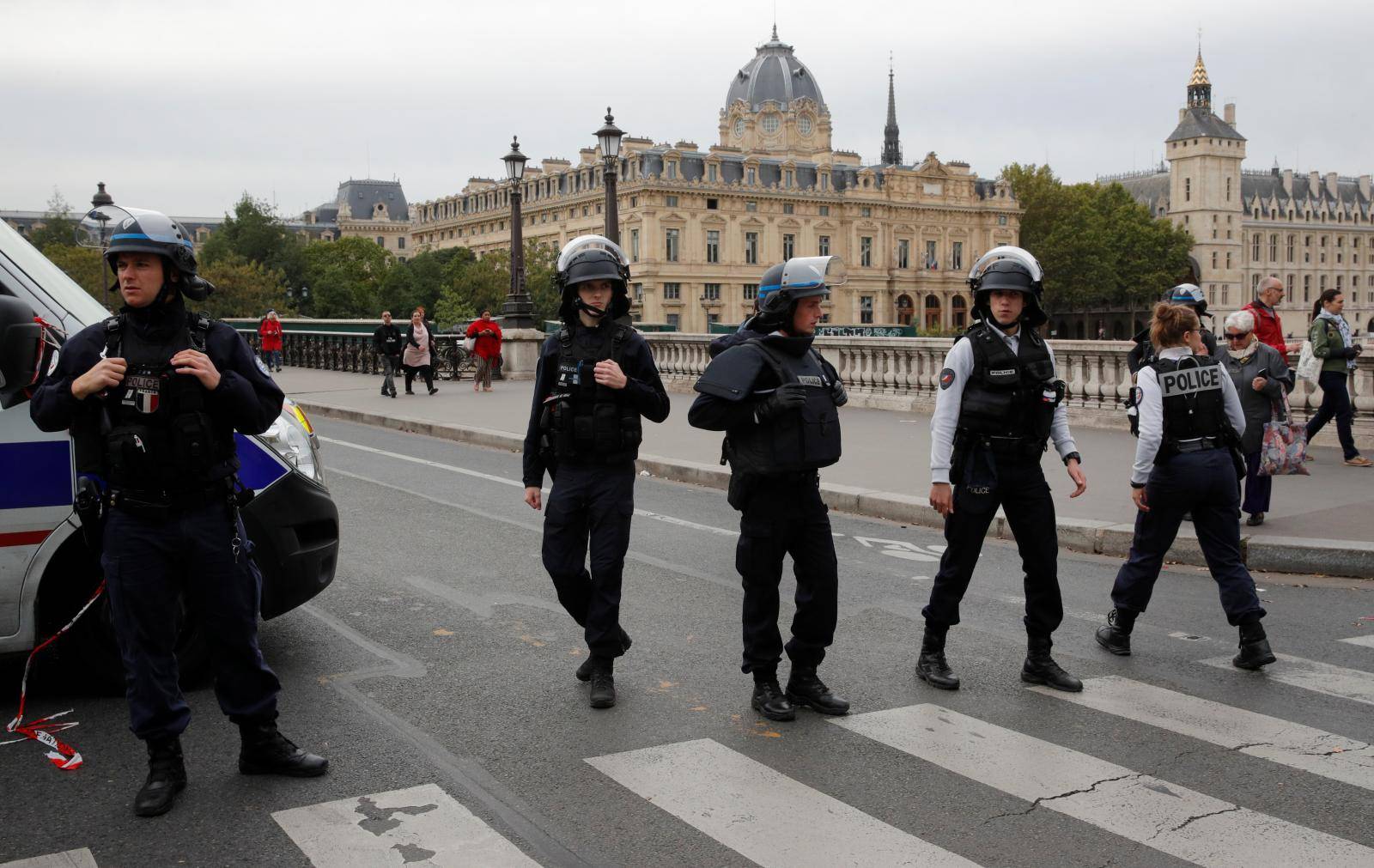 French police secure the area in front of the Paris Police headquarters in Paris