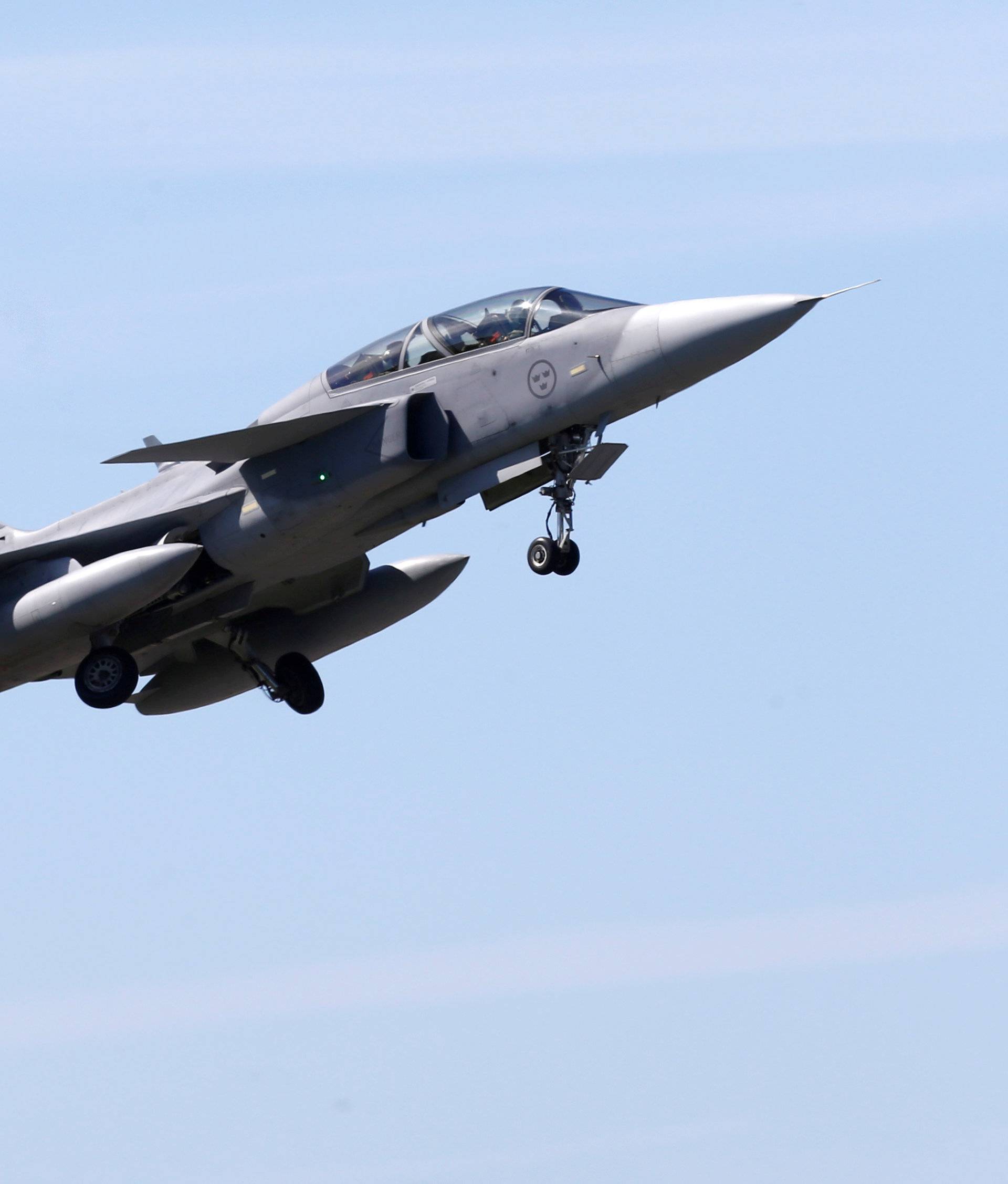 FILE PHOTO: Sweden's Air Force Saab JAS 39 Gripen fighter takes off during the AFX 18 exercise in Amari military air base
