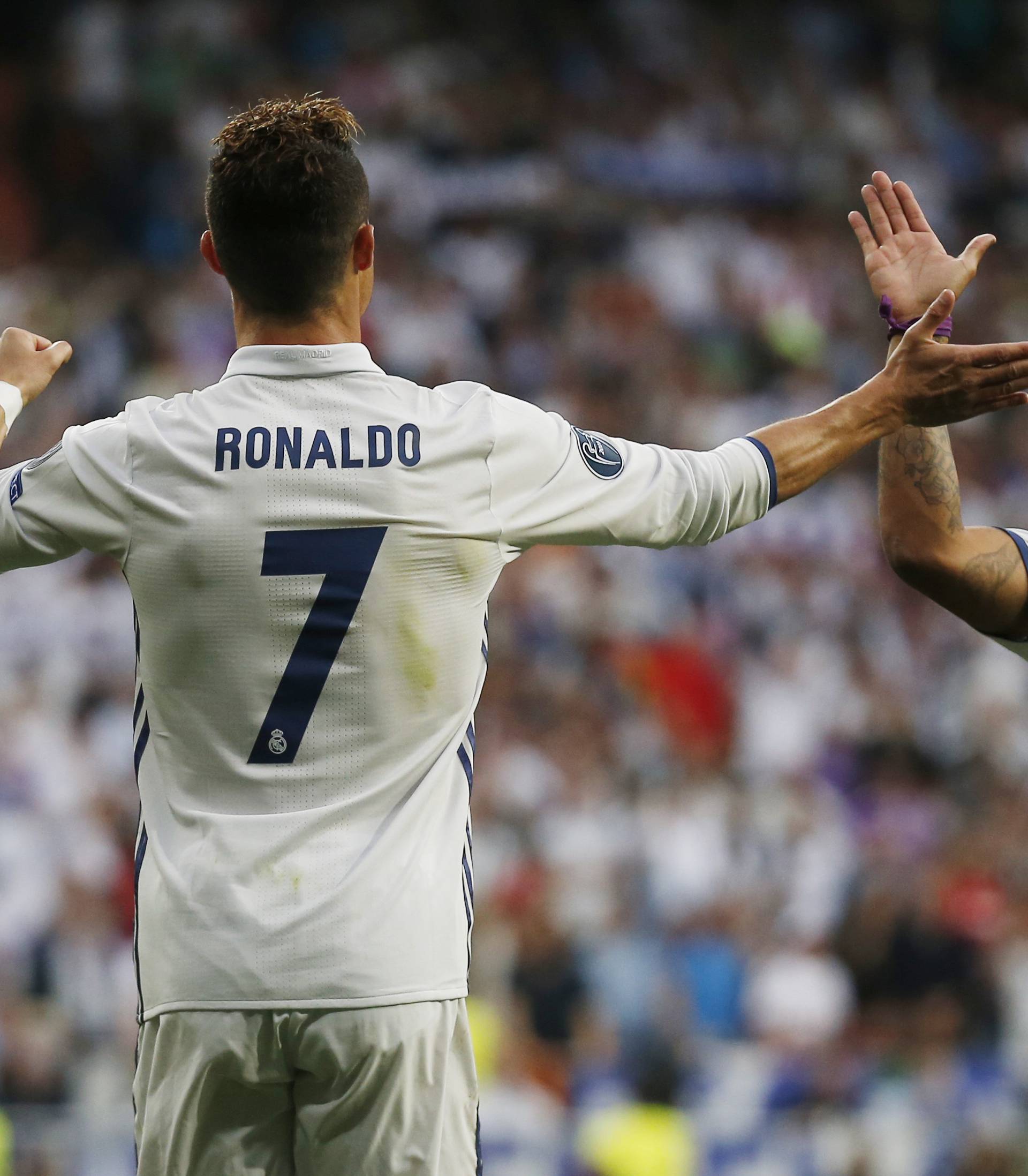 Real Madrid's Cristiano Ronaldo celebrates scoring their first goal with Marcelo