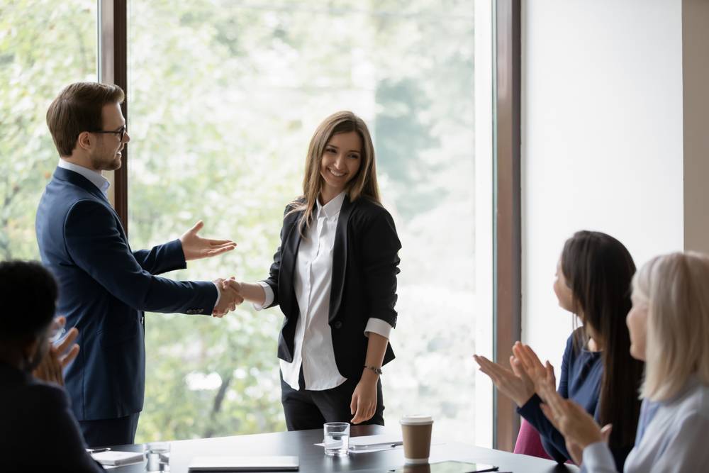 Male,Businessman,Ceo,Executive,Shaking,Hand,Of,Smiling,Happy,Millennial