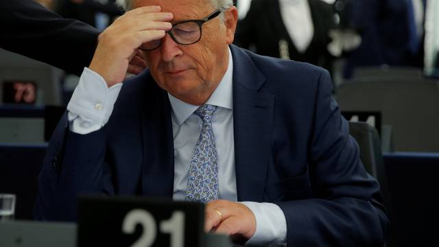 European Commission President Juncker reacts before a debate on The State of the European Union at the European Parliament in Strasbourg