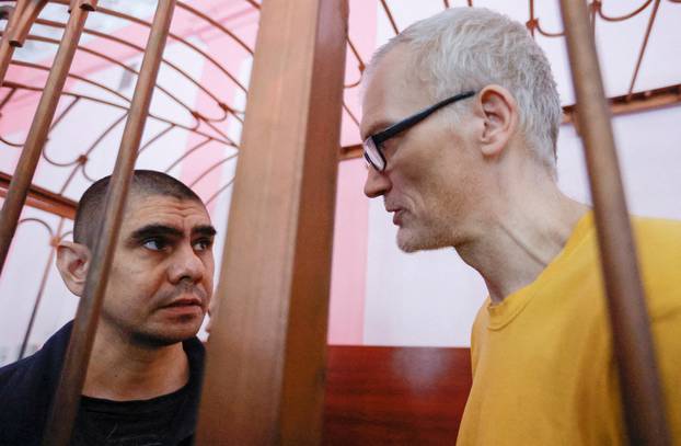 Foreign nationals captured during Ukraine-Russia conflict attend a court hearing in Donetsk