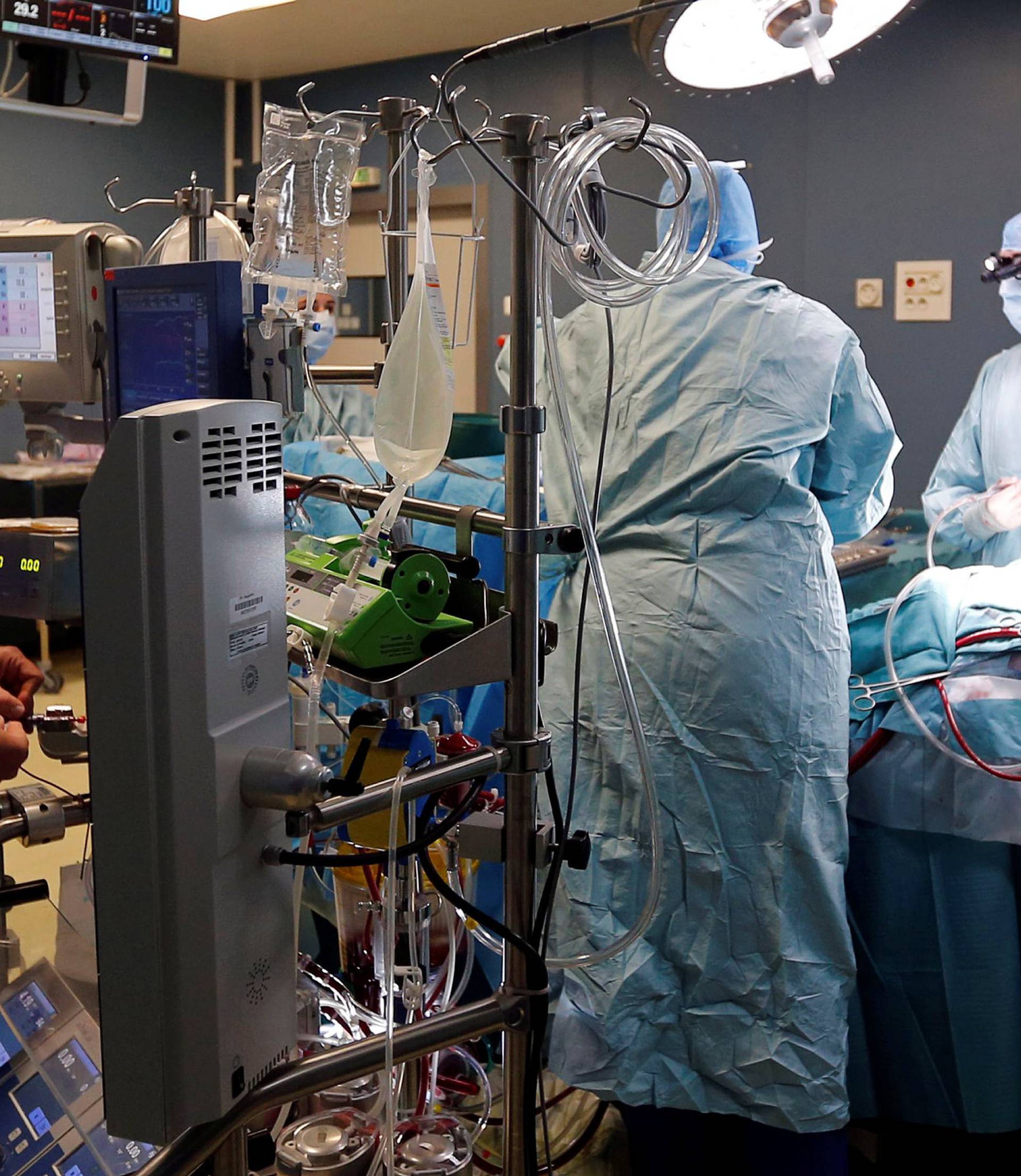 Medical team perform a heart surgery in an operating room at the Saint-Augustin clinic in Bordeaux