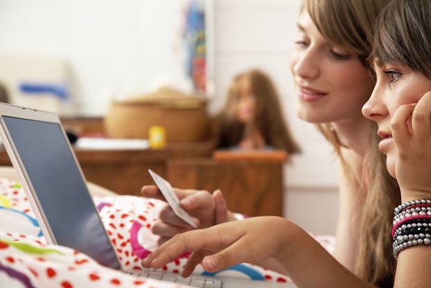 Girls Shopping on Laptop