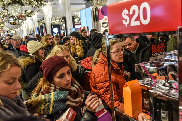 People shop during a Black Friday sales event at Macy