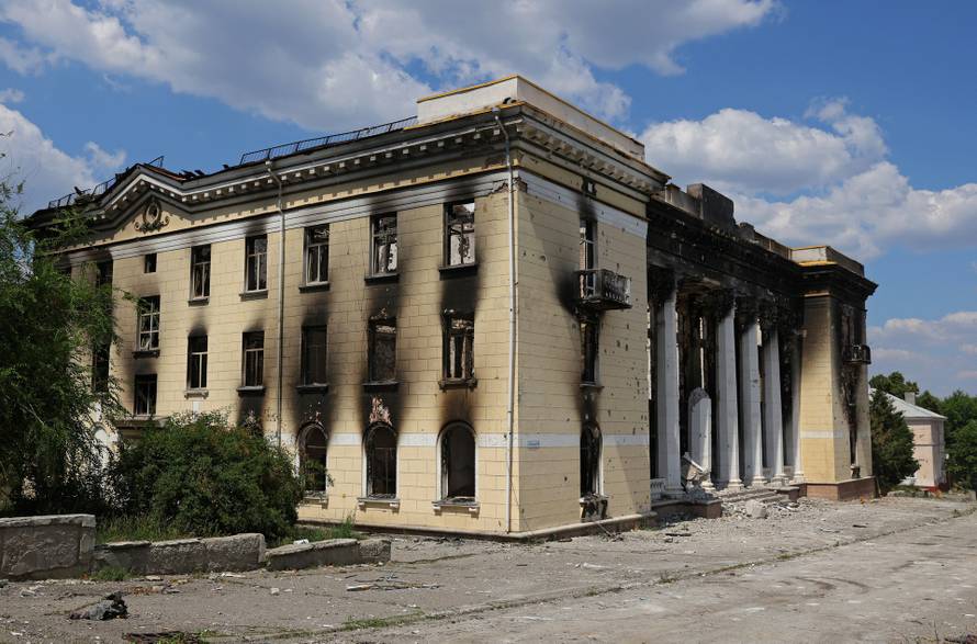 A view shows a destroyed public building in Lysychansk