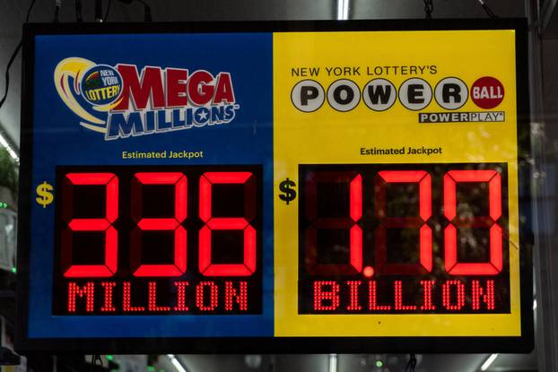 Sign shows the $1.7 billion jackpot in the Powerball lottery drawing in New York City